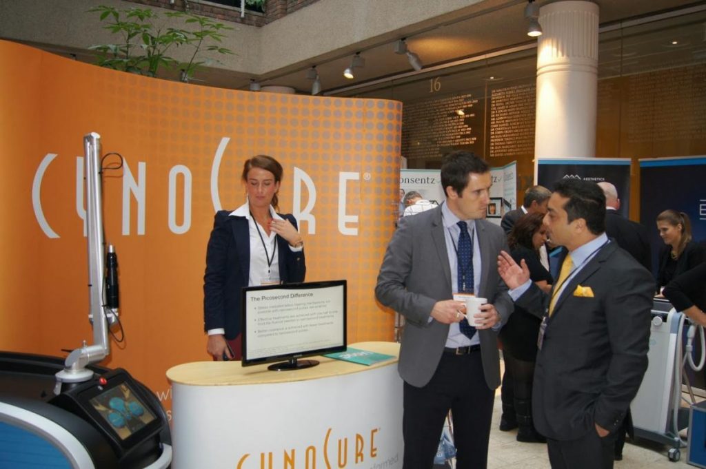 Cellulaze Dr Ayham Al-Ayoubi in discussion with representatives from Cynosure
